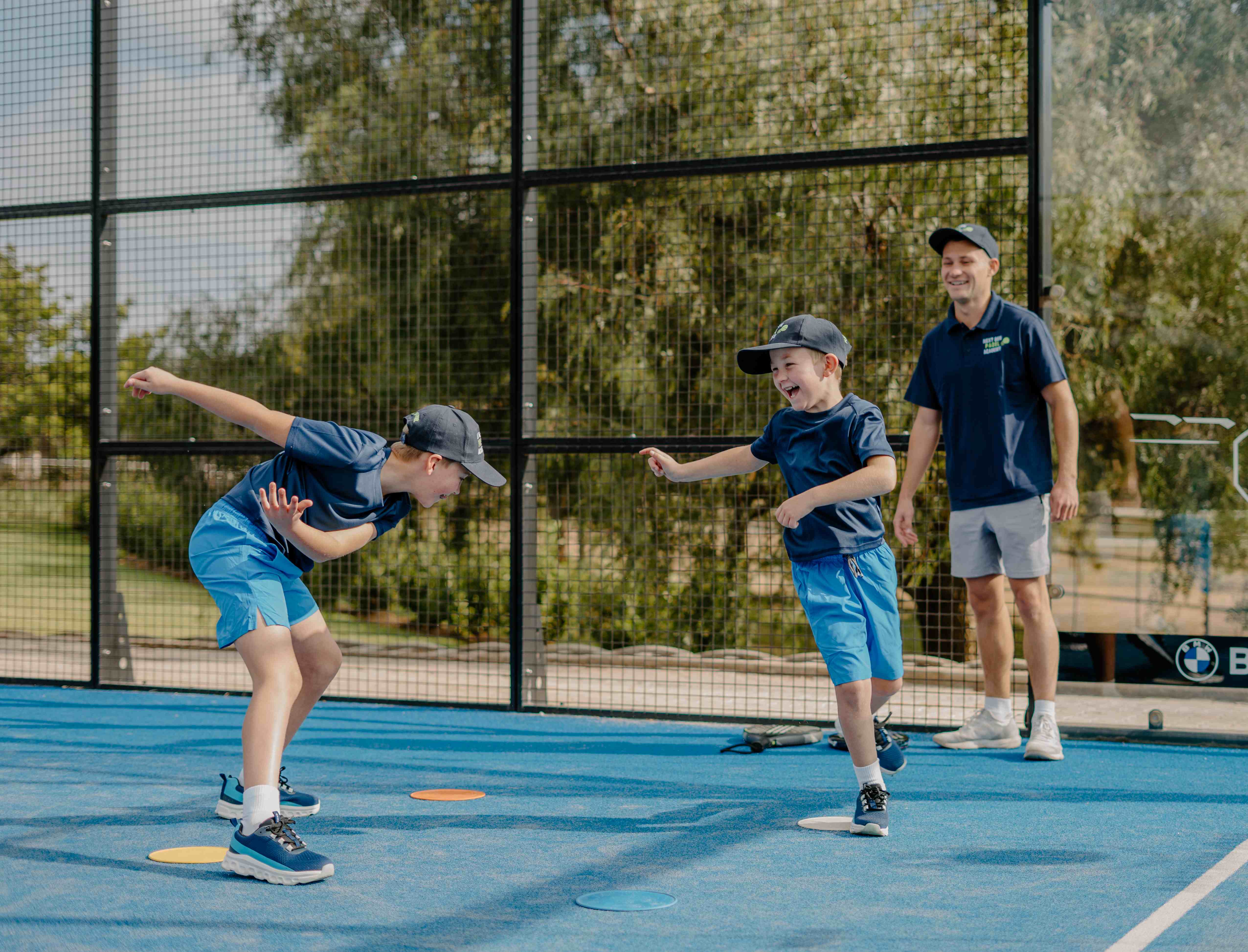 Junior players doing agility drills with a coach at a NextGen Padel Academy session in Pretoria